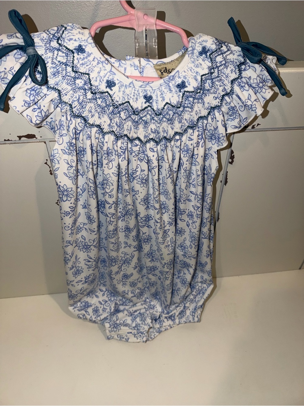 Smocked Blue Floral Baby One-Piece Bodysuit with Tie Shoulders